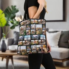 a woman carrying a large bag with pictures on the front and sides, in a living room