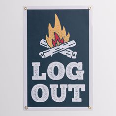 a sign that says log out with a fire and skis on top of it