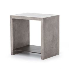 the concrete side table is made from cement blocks