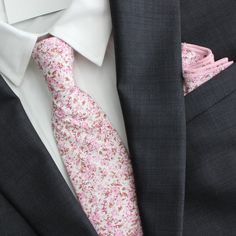 Color: Pink & White Floral Imported and Handmade Material: 100% Cotton Adult Necktie Dimensions: Width: approx. 2.25 in/6 cm Length: approx. 56 in Adult Pre-Tied Bow Tie: Bow Tie dimensions: approx. 4.75 inch width by 2.5 inch length Necksize 11.5 inches - 20 inches Metal clasp for secure and comfortable wear. Child Pre-Tied Bow Tie: Bow Tie dimensions: approx. 4 inch width and 2 inch length - Necksize 11 inches - 19 inches Plastic clasp for each wear and removal. Pocket Square: 9 in x 9 in or 2 Dusty Rose Floral Tie, Gray Suit Pink Tie, Groom Attire Black Suit, Black Suit Pink Tie, Suits With Pink Ties, Grey Suit Pink Tie, Homecoming Guys Outfits, Grey Suit White Shirt, Floral Suit Men