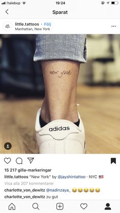 a person with a small tattoo on their foot and the caption reads, new york