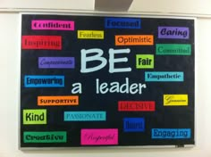 a bulletin board with words written in different colors and phrases on it that say be a leader