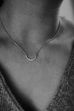 This beautiful necklace is a simple and elegant addition to our beaded line. We’ve hammered bead wire into a small, slightly curved shape. Now with a thicker, even more durable chain! The curved bead pendant measures approx. .75″ in size. The necklace hangs from a delicate 14K gold-filled, 14K rose gold filled, or sterling silver chain and closes with a handmade necklace closure. Choose from 14K GOLD FILL, 14K ROSE GOLD FILL, or STERLING SILVER. **Please note that the Sterling Silver version of Small Bead Necklace, Minimal Choker, Necklace Closure, Bead Wire, Bead Pendant, Beautiful Necklace, Handmade Necklace, Beaded Pendant, Bead Necklace