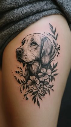 a black and white tattoo of a dog on the side of a woman's thigh