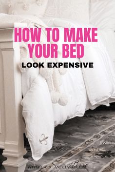 a white bed with pink lettering on it and the words how to make your bed look expensive