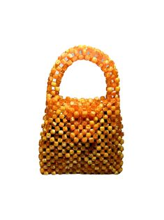 Artisan Beaded Handbag.Designed in NYC. Crafted with precision in the heart of Lagos, Nigeria.Elevate your style with our exquisite beaded handbags – a timeless accessory that seamlessly blends sophistication with versatility. Meticulously handcrafted, these bags are built to withstand the test of time. Whether paired with a cocktail dress, jeans and a tee, professional attire, or your favorite clubwear, our bead bags effortlessly complement any ensemble. Bead Bag, Dress Jeans, Lagos Nigeria, Beaded Handbag, Professional Attire, Detail Shop, Timeless Accessories, Beaded Bags, Contemporary Fashion