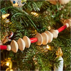 an ornament is hanging on the christmas tree