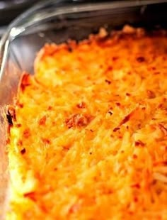 a cheesy casserole in a glass dish