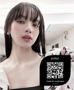 a woman in a black and white dress is looking at the camera with a qr code on her chest