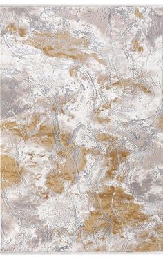 a beige and white rug with an abstract design on the bottom, in shades of gold