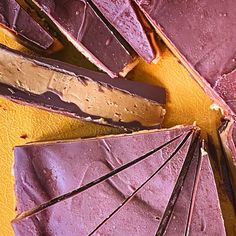 there are many pieces of chocolate that have been cut into squares and placed on top of each other