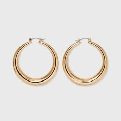 Update your jewelry pieces for any occasion with these Thick Hoop Earrings from A New Day™. These round hoop earrings feature a simple thick profile and a gold-tone metallic finish that pairs effortlessly with your existing jewelry items. These lightweight hoop earrings come with hinge closures for secure and comfortable wear, and are made from nickel-free metal to suit most skin types. A New Day™: Style that goes wherever you do. Gold Hoop Earrings Aesthetic, Brrr Basket, Target Earrings, Natural Essence Style, Big Gold Hoop Earrings, Soft Natural Style, Hoop Earrings Aesthetic, Golden Hoop Earrings, Little Words Project