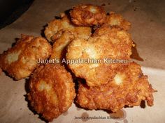 some fried food sitting on top of a piece of paper