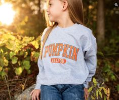 Pumpkin Season Mommy & Me Shirt Set ( Tee or Sweatshirt) Match your 'lil cutie's style with these adorable Mommy & Me pieces of apparel. Fall for these fun Mom & me shirts featuring two styles! It'll keep you both stylish and comfy through the chilly months. Playful Letter Print Tops For Fall, Playful Tops With Letter Print For Fall, Cute Fall School Tops, Fall School Spirit Relaxed Fit Tops, Cute Tops For School In Fall, Playful Relaxed Fit Tops For Fall, Relaxed Fit Tops For School Spirit In Fall, Cute Fall Tops For School, Playful School Top For Fall