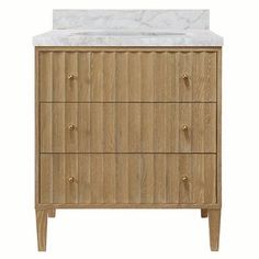 a bathroom vanity with marble top and wooden drawers on the bottom, against a white background