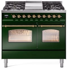 a green stove with two ovens and gold knobs on the top, in front of a white background