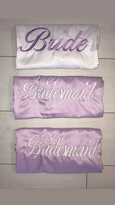 three purple and white sashs with the words bride, bridesmaid, and bridesmaid written on them