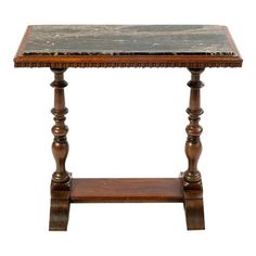 an old wooden table with marble top and legs on the bottom, against a white background