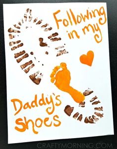 a hand and foot print is shown on the screen, with words below it that read following in my daddy's shoes