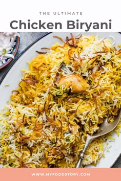 the ultimate chicken biriyani recipe on a white plate with a pink border