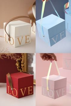 four different boxes with the word love on them and ribbons tied to each box, all in different colors