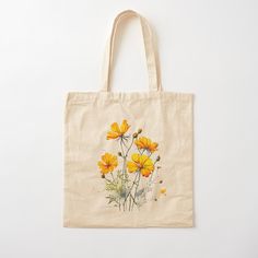 a tote bag with yellow flowers painted on it