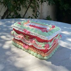 three cakes are stacked on top of each other