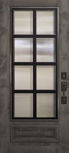 the front door is made of metal and has frosted glass panels on each side