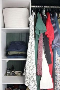 the closet is full of clothes and other things to put on it's shelves