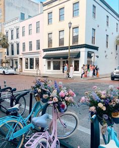 several bicycles parked next to each other on the street