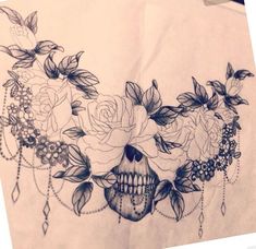 a drawing of a skull with flowers on it