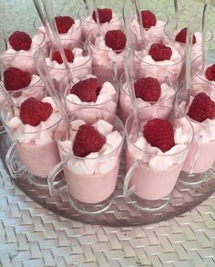 there are many desserts with strawberries in the cups