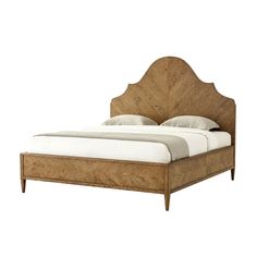 a bed that is made up with wood and white linens on the headboard