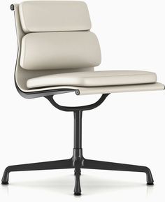 an eames chair with white leather upholstered seat and black metal base, viewed from the front