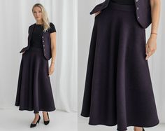 "The wool skirt has a viscose lining. It is cut with a flattering flared skirt to give you a wonderful shape. It hangs well and the weight helps it keep a nice a-line shape. The elastic in the back is supportive, but not tight so it should help keep the skirt comfortable throughout the day. The winter skirt is perfect for classic styling. 📌  Check your measurements in the size chart to avoid returns or exchanges!     ** Every wool garment has different measurements. We want to make sure the ite