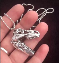 "Seriously Awesome double sided 3D Tyrannosaurus Rex skull pendant on 30inch ball bead chain. you will receive :- 1x 3D T-Rex skull pendant, with 30inch ball bead chain in gift bag :) (As pictured) Silver alloy 3D T-Rex skull pendant with 30inch ball bead chain All my items are Fast dispatch within 24hours. FREE P+P! Material: zinc alloy Main colour: plated antique silver (as pictured) Pendent size approx: 3.5mm x 3.2cm Silver coloured ball bead chain 30\" long UK 2nd class P&P UK seller I hand make most of my items and am very proud with the quality o the items I sell, please if there are any problems, please send me a message and let me know, I want all my customers to be happy and buy from me again with hesitation. Please check out my others items :) Fast dispatch usually within 24hours Tyrannosaurus Rex Skull, T Rex Skull, Dinosaur Skull, Funky Necklace, Skeleton Head, T Rex Dinosaur, Jewelry Pliers, Costume Necklaces, Skull Necklace