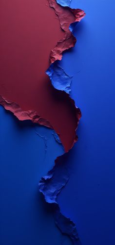 red and blue paper with torn edges on the bottom left corner is shown in full color