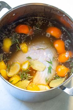 a pot filled with food sitting on top of a stove