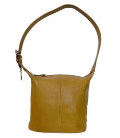 This is a vintage c. 1987 Coach 'Mini Soho' bucket bag in a tan leather with the creed no. L7H-4148, Made in the United States. Beautiful condition with some tiny marks and scuffs as shown. This bag has a clean interior and shows signs of minimal wear. All photos displayed are of the actual item Measurements; Height: 8" Length: 8" Depth: 3" Strap drop: 13 1/2" Tan Leather Bag, Santa Fe Nm, Vintage Coach, Photo Displays, Santa Fe, Soho, Tan Leather, Purses And Handbags, Bucket Bag