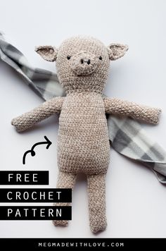 a small stuffed animal laying on top of a white surface with text overlay that reads free crochet pattern