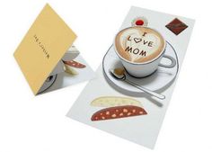 there is a card with a cup of coffee on it