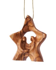 a wooden ornament hanging from a chain on a white background in the shape of a star