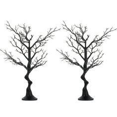 two black vases with trees in them on a white background, one is empty and the other has no leaves