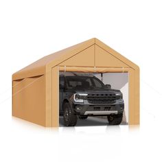 a truck is parked in a garage with the door open to show it's interior