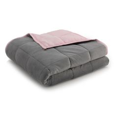 a gray and pink comforter on a white background