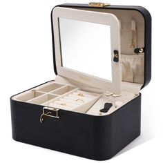 PRICES MAY VARY. Leather + Velvet lining + Lock + Key Kamier Men Jewelry Box Hidden Design: A large mirror is built into the lid, there are 10 necklace hooks and two elastic pleated pockets inside the mirror to fix the necklaces in place. Double Layer & Large Storage Space: In the first layer, there are 1 earrings plate, 2 extra removable spaces and 8 rings holders, In the second layer, there is a removable space to store watches or something larger keepsakes. Double Safeguard: Double lock desig Jewelry Box With Lock, Necklace Hooks, Necklace Storage, Double Lock, Leather Jewelry Box, Travel Jewelry Box, Jewelry Organizer Box, Travel Jewelry Case, Gift Box Packaging