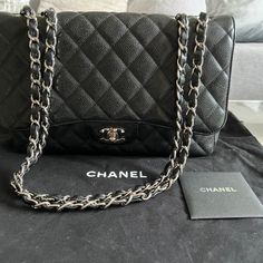 Selling An Authentic Chanel Classic Caviar Jumbo Flap In Silver Hardware. This Item Was Purchased At The Nordstrom Chanel Boutique In 2010. This Bag Is Very Spacious But Still Lightweight. The Back Of The Bag And A Small Corner On The Front Flap Had Some Color Rub Off (I Think From Brushing Against My Jeans), But The Rest Of The Handbag Is In Great Condition. You Can Bring The Bag To Chanel To Have Them Recolor It For A Fee Or To Leather Surgeons. Comes With The Chanel Dust Bag (There Are Two Mi Luxury Double Flap Bag, Elegant Double Flap Bag For Business, Elegant Business Double Flap Bag, Timeless Double Flap Bag, Luxury Double Flap Bag For Travel, Luxury Double Flap Shoulder Bag For Formal Occasions, Luxury Double Flap Travel Bag, Elegant Double Flap Bag With Dust Bag Included, Elegant Double Flap Shoulder Bag