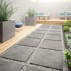 an outdoor patio with potted plants and benches