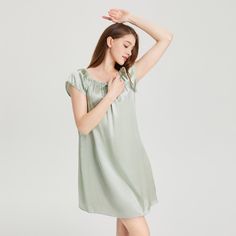 This 19 Momme Silk Short Sleeve Ruffle Silk Chemise is made of 100% Mulberry silk, which is washable. The simple yet modern design gives this 100 silk chemise a perfect silhouette. The washable silk chemise is the star line of THXSILK pajamas and includes a silk camisole top, short robe and pajamas sets. The ruffle design lets you have sweet style. It is a must-have for lounging at home. After purchasing it you will find that you need this lovely nightgown every night, with a comfortable and bre Elegant Satin Sleep Tops, Elegant Silk Sleep Tops, Elegant Silk Summer Nightgown, Elegant Silk Nightwear Tops, Elegant Silk Summer Sleepwear, Elegant Silk Sleepwear For Summer, Elegant Solid Silk Sleepwear, Feminine Silk Nightgown For Summer, Modal Satin Summer Sleepwear