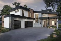 this is an artist's rendering of a two story house with garages and large windows